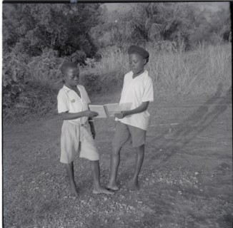 Two boys reading