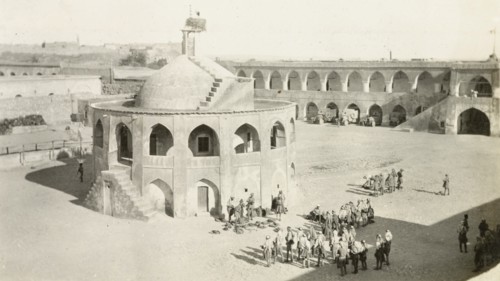 Troops in ancient courtyard