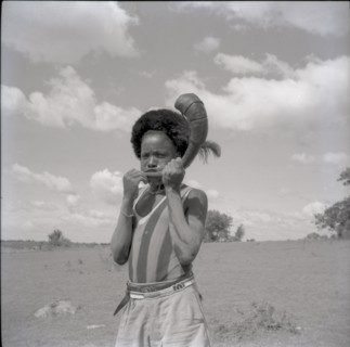 Youth with horn