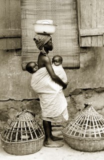 Yoruba woman with two babies