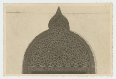 Top portion of ornately carved doorway