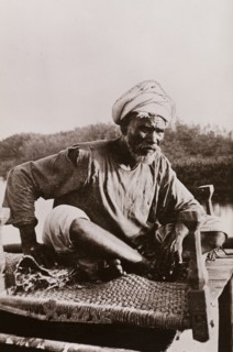 Portrait of an elderly, turbanned man described as a guide