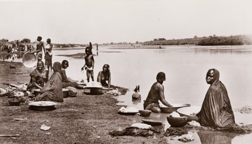Women washing clothes in the river at Wau, Bahr-El-Ghazal