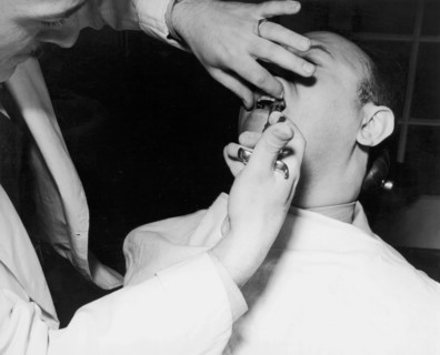 Dentist Giving A Novocain Shot