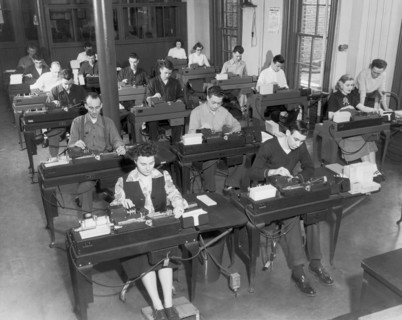Workers Using Data Punch Cards
