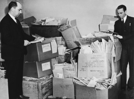 Men With Piles Of Mail