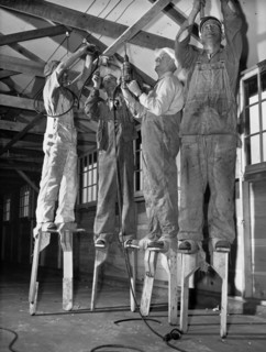 Electricians On Stilts