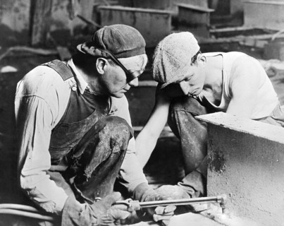 Men With Cutting Torch