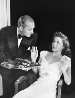 A Waiter Offers A Microphone