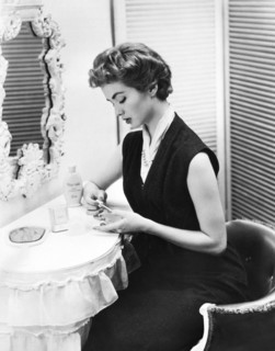 Woman Taking Care Of Her Nails