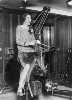 Woman Riding An Electric Horse