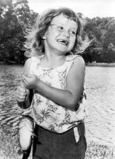 Happy Girl With Catfish
