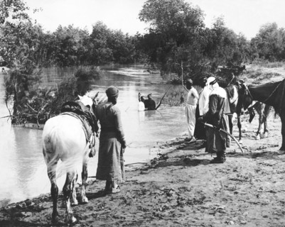 A Man Baptized In A River