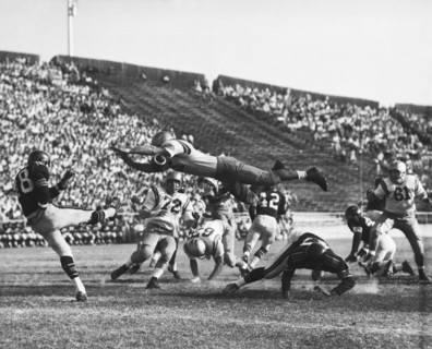 Player Blocks Football Punt