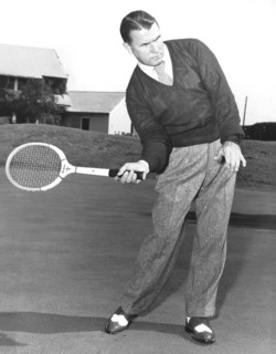 Man Posing With Sports Gear