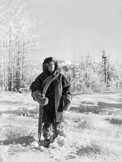 Man With Parka And Snowshoes