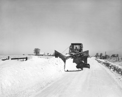 Snow Plow Clearing Roads