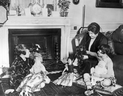 Adopted Girls With Their Dolls
