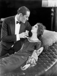 Man Tends To Ill Woman