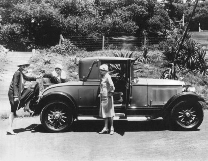 Climbing Into A Rumble Seat