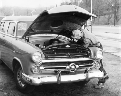 Man Working On HIs Car