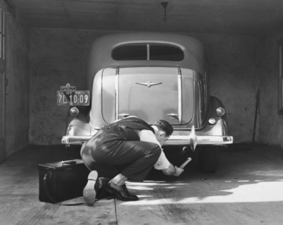Man Working On HIs Car