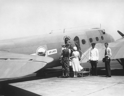 Passengers Boarding Airplane