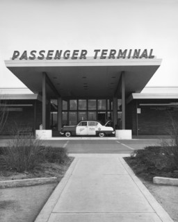 Denver, Colorado:  c. 1954
A taxi cab at the entrance to the passenger terminal at Stapleton