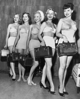 Five Women Pose With Bags