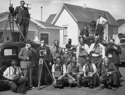 Reporters With Gas Masks