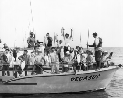 Boys Hold Up Their Fish