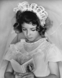 Girl Reading A Prayer Book
