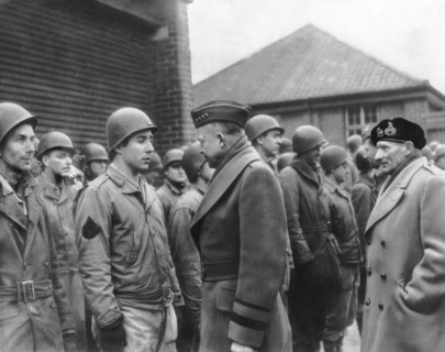 Ike Checks Invasion Forces