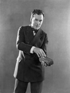 Man Holding A Brick