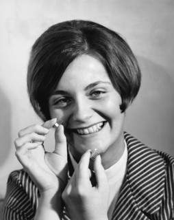 Woman Holds Integrated Circuit