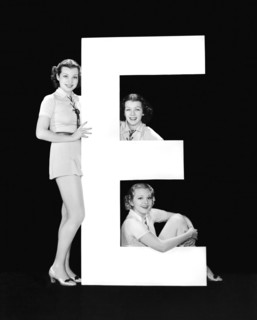 The Letter "E" And Three Women