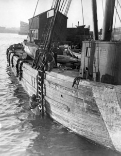 A Deep Sea Diver On A Boat