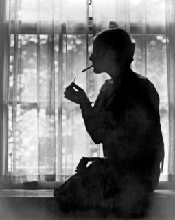 Silhouette Of A Woman Smoker