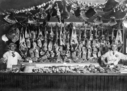 United States:  December 17, 1915.
Two butchers proudly display their products.