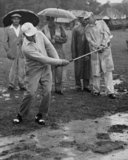Golfer Playing In The Rain