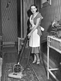 A Woman Vacuuming