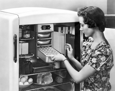 A Woman Making Ice Cubes