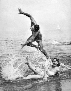 Couple Frolics In The Surf