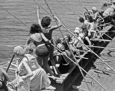 Women Fishing With Cane Poles