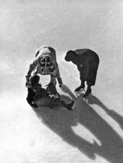 A Skater Gets Help From A Friend
