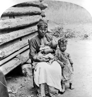 Woman Breast Feeding Her Baby