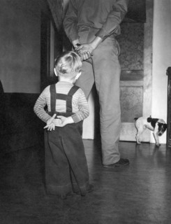 A Boy Imitates His Father