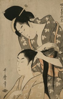 Women works as a hairdresser on another woman