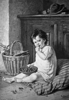 Child eating cherries