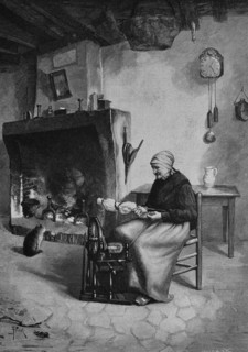 Woman spinning wool